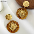 Golden Sunburst Statement Earrings