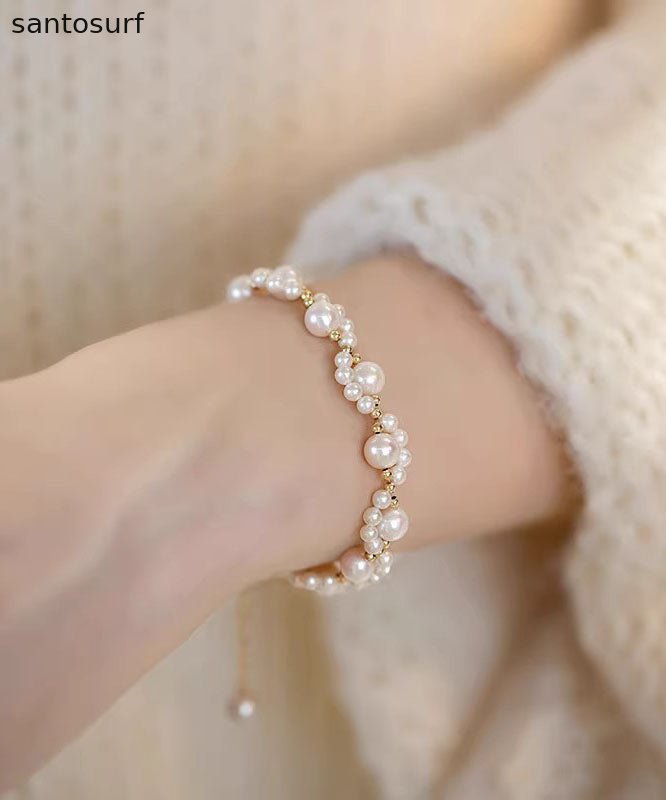 Cute White 14K Gold Pearl Charm Bracelet