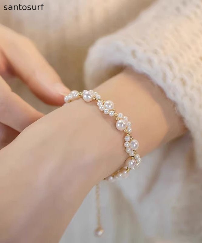 Cute White 14K Gold Pearl Charm Bracelet
